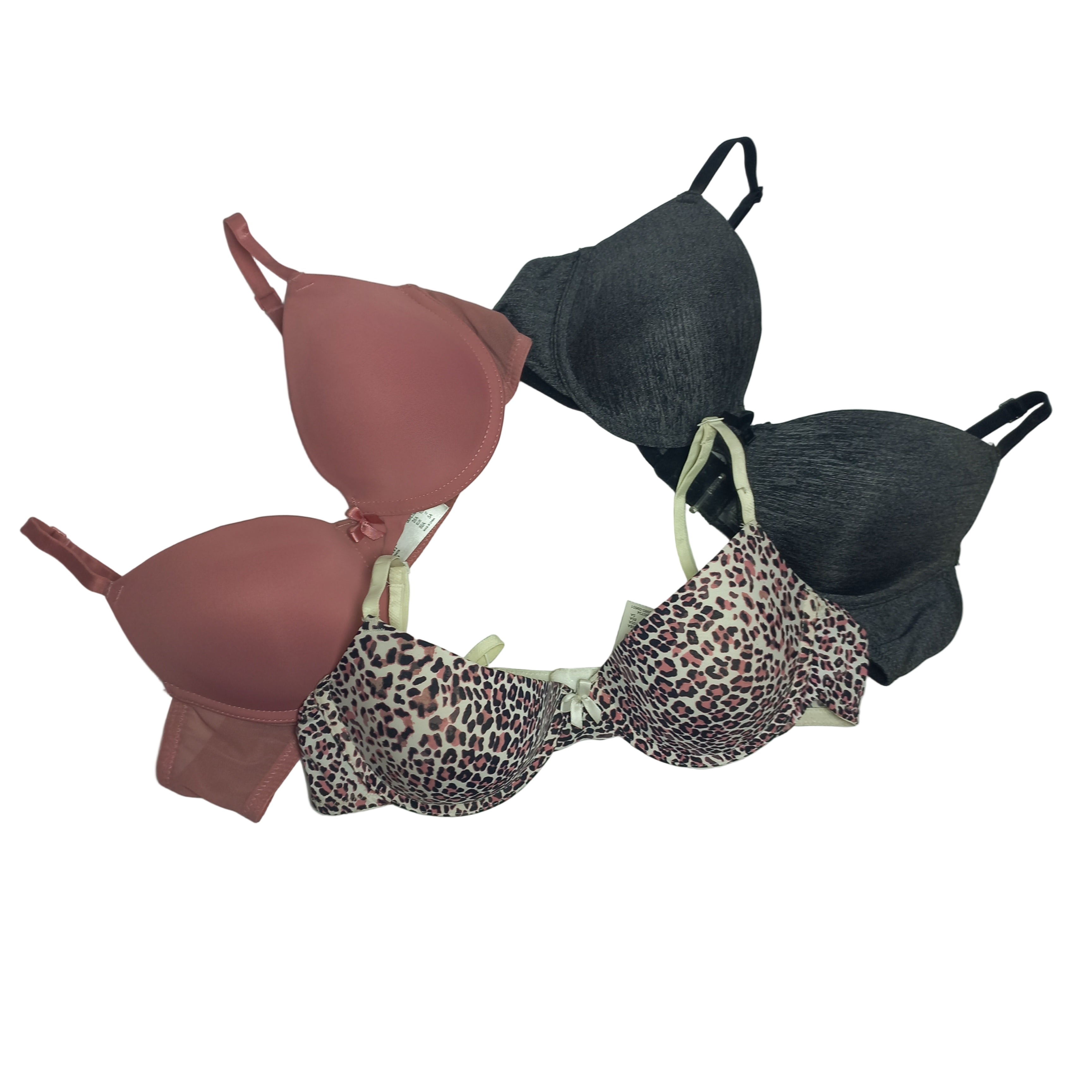 3 Primark bras in different styles and colors on a white background