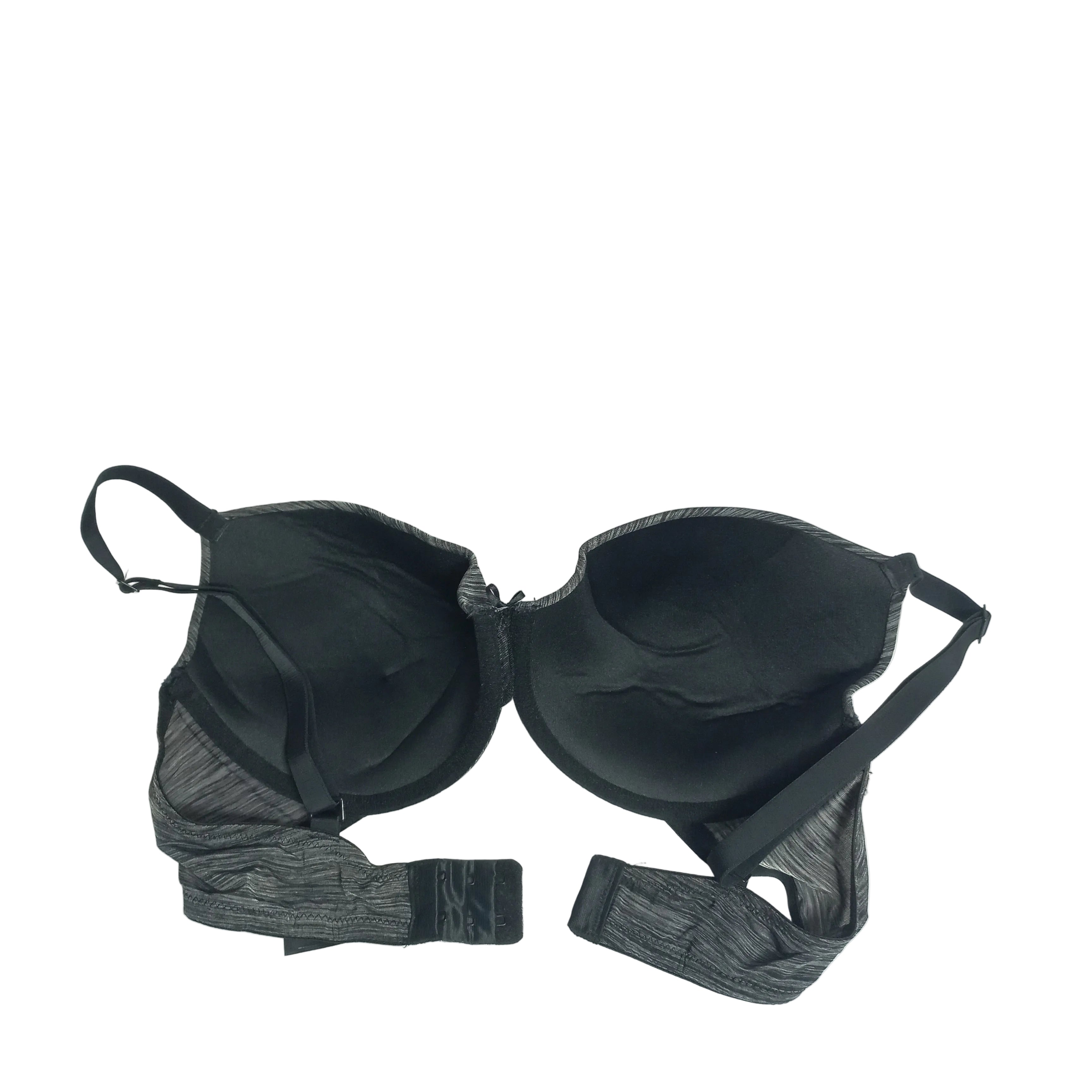 Black bra with gray straps on a white background
