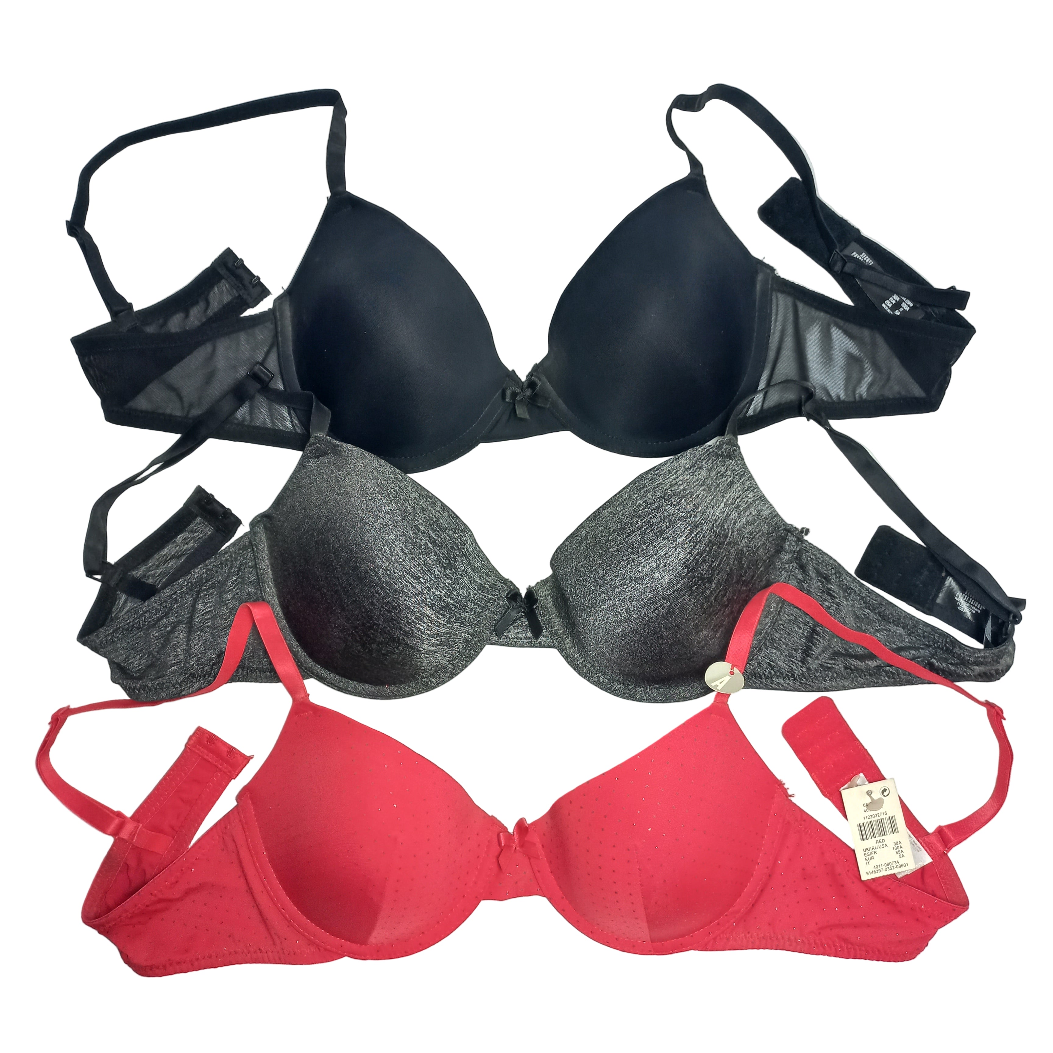 Black, gray, and red Primark bras on a white background