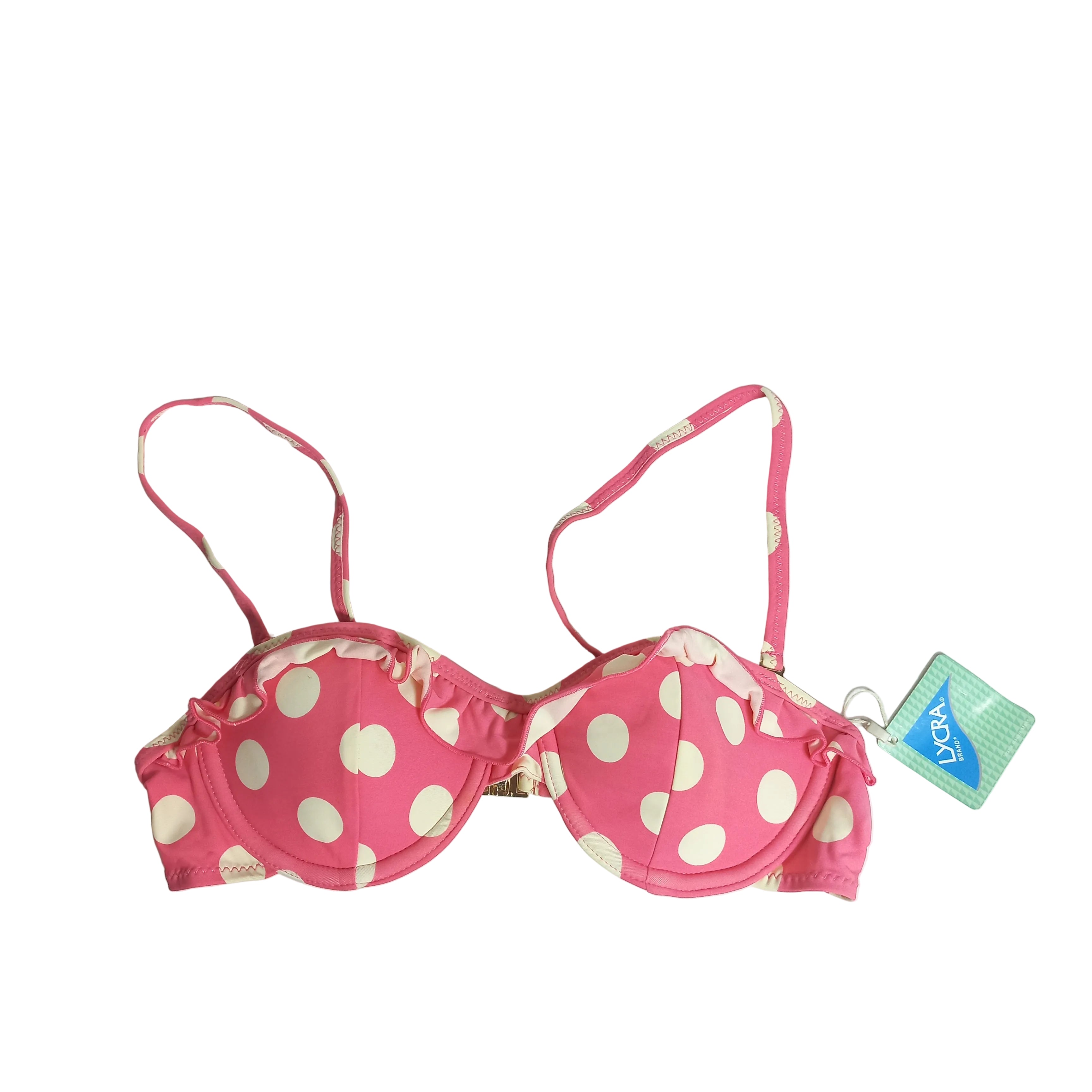 Pink bikini with white polka dots on a light gray background