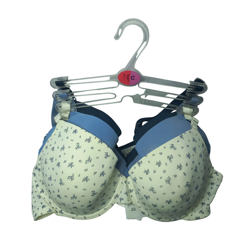 Primark C cup T shirt bra in beige, smooth support shown front view
