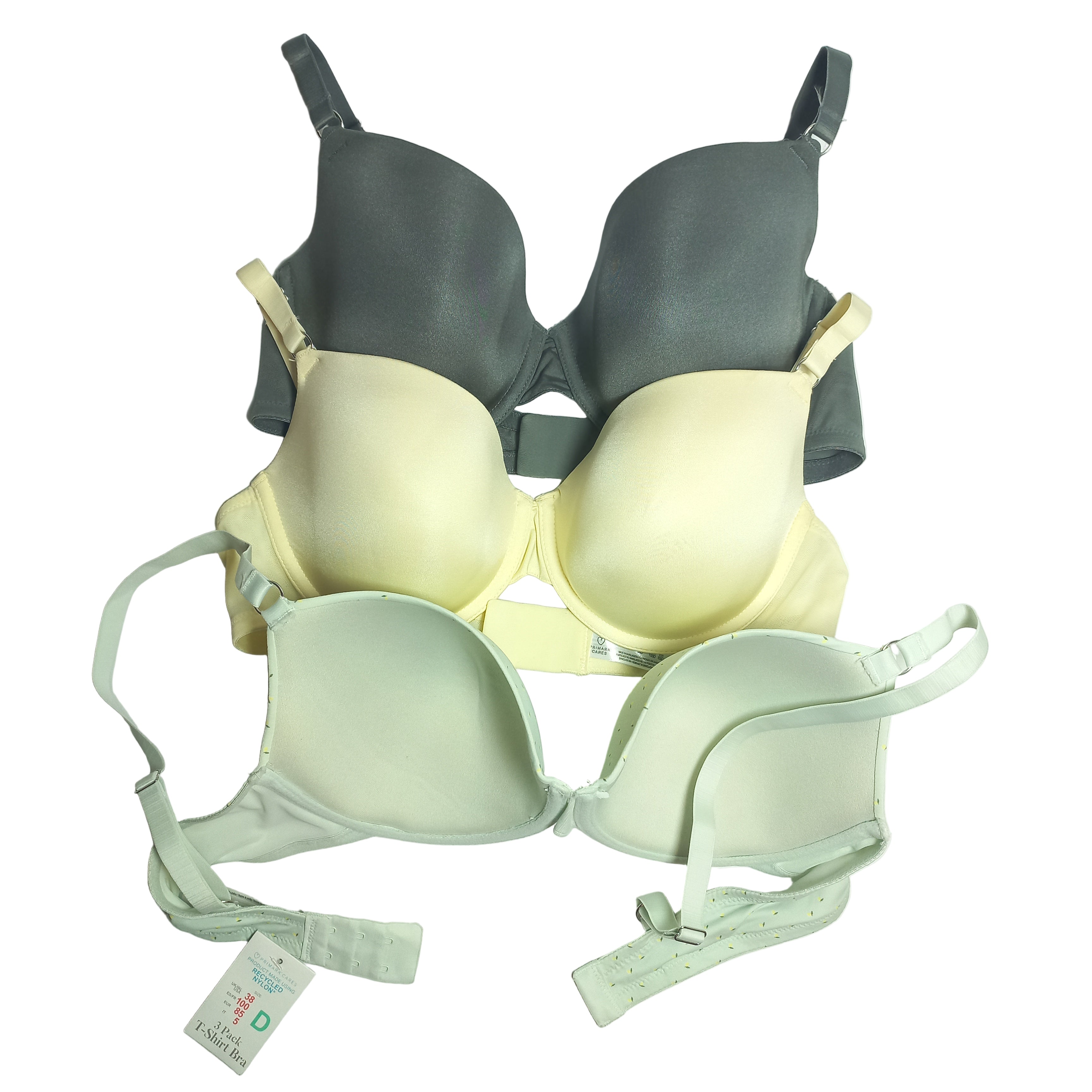 Primark Set of green and beige bras on a white background