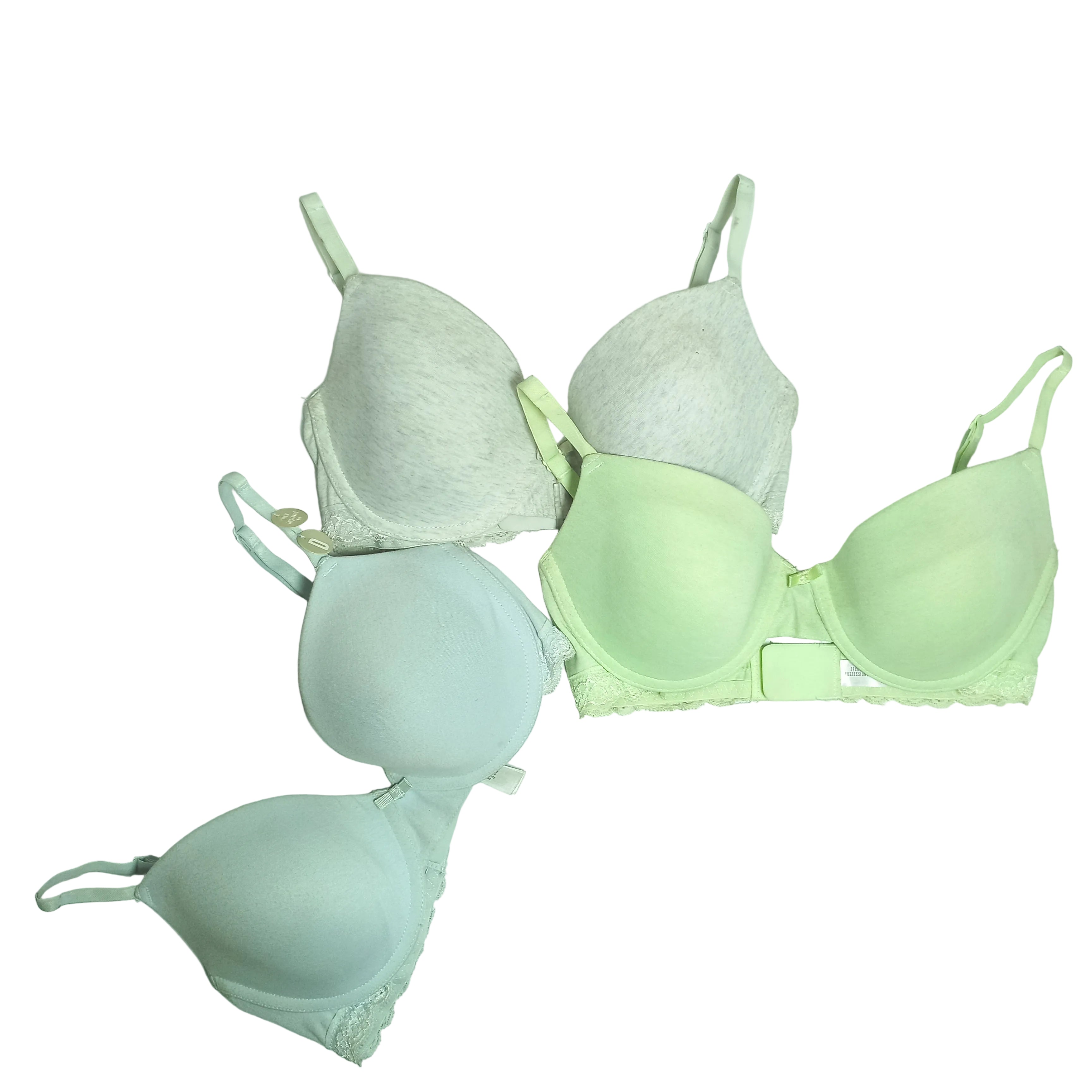 Set of green T shrit primark bras on a white background