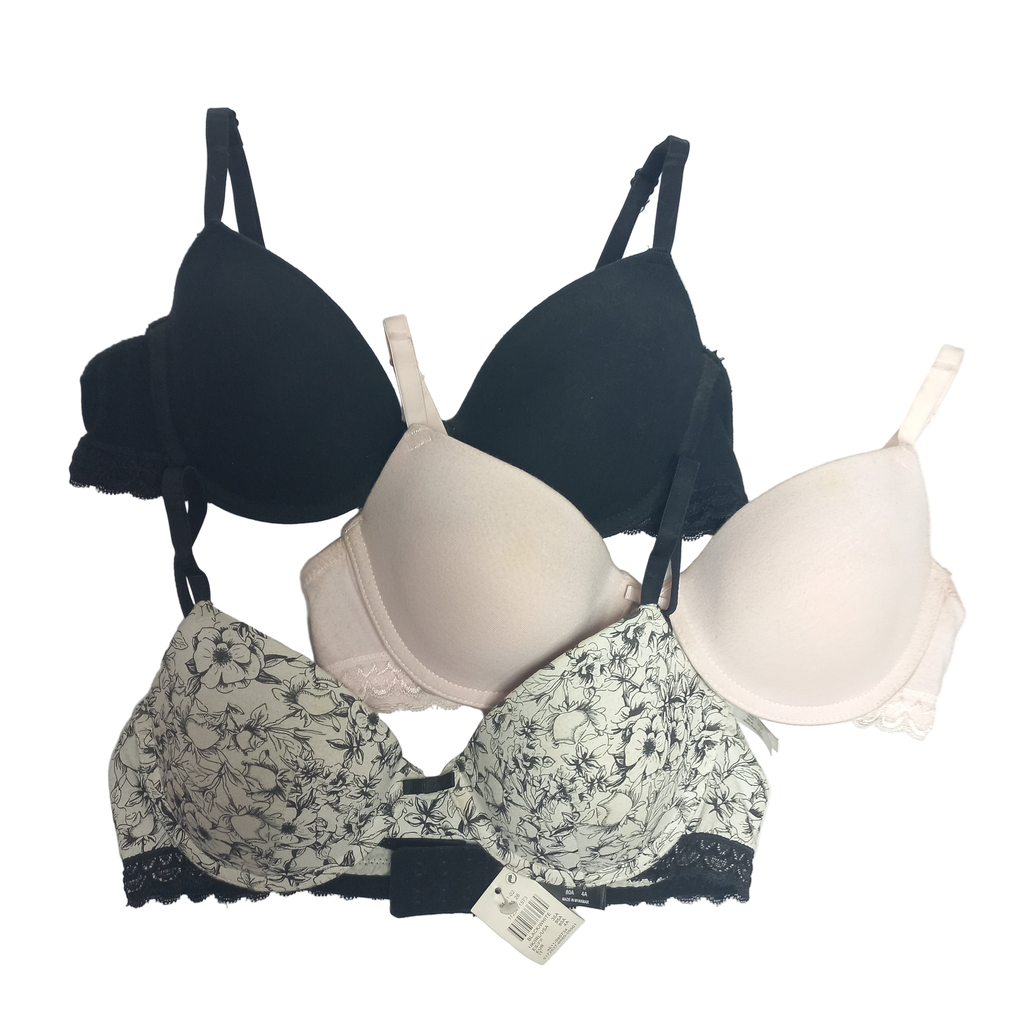 Three Primark T-Shirt bras in different styles and colors on a white background