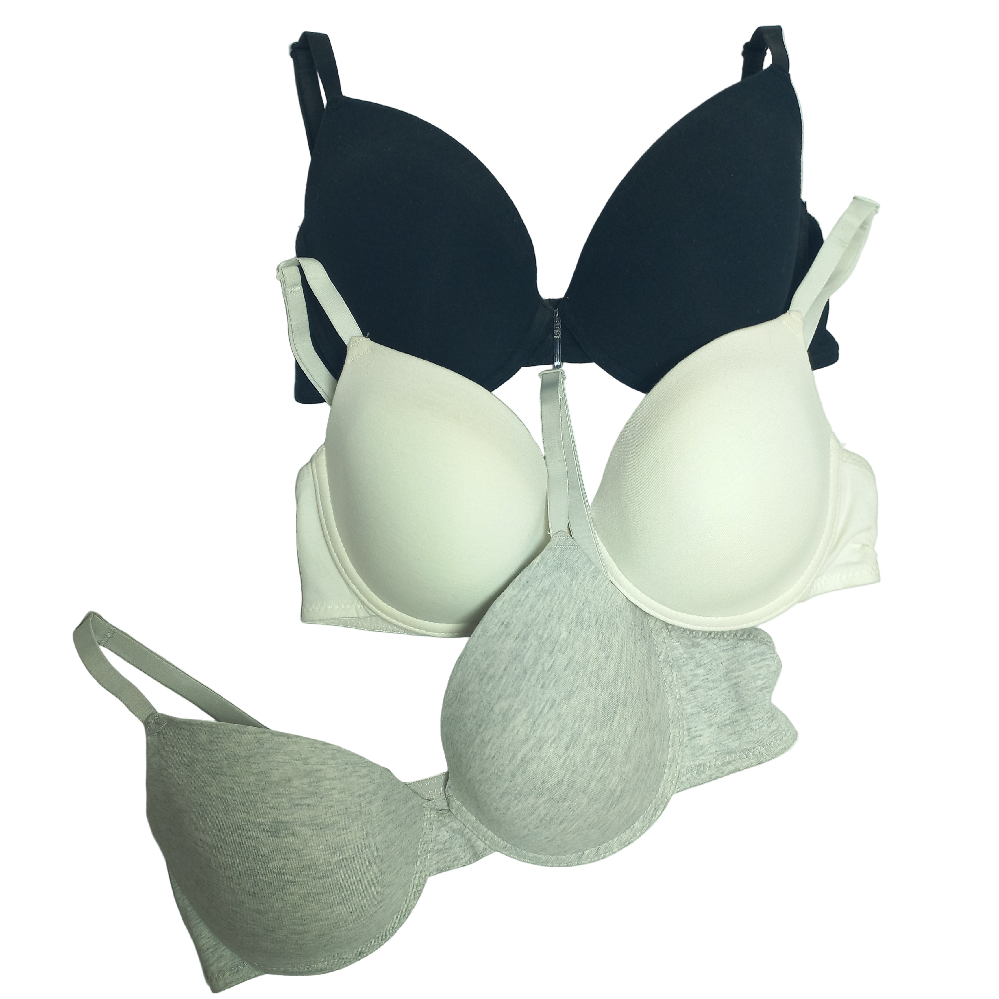 Three Primark T-Shirt bras in black, white, and gray on a light gray background
