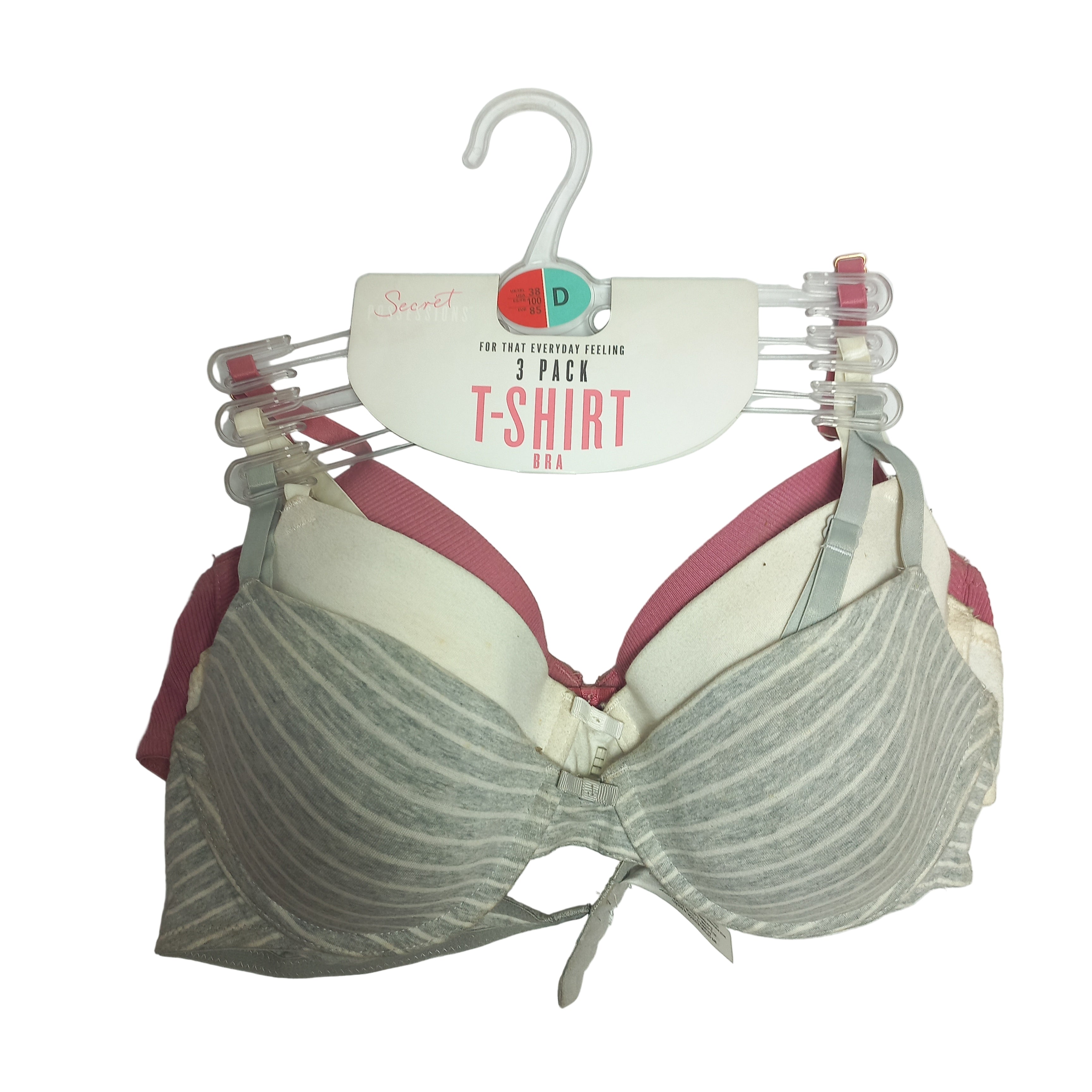 Three Primark T-Shirt bras, a striped bra on a hanger with a brand tag against a white background