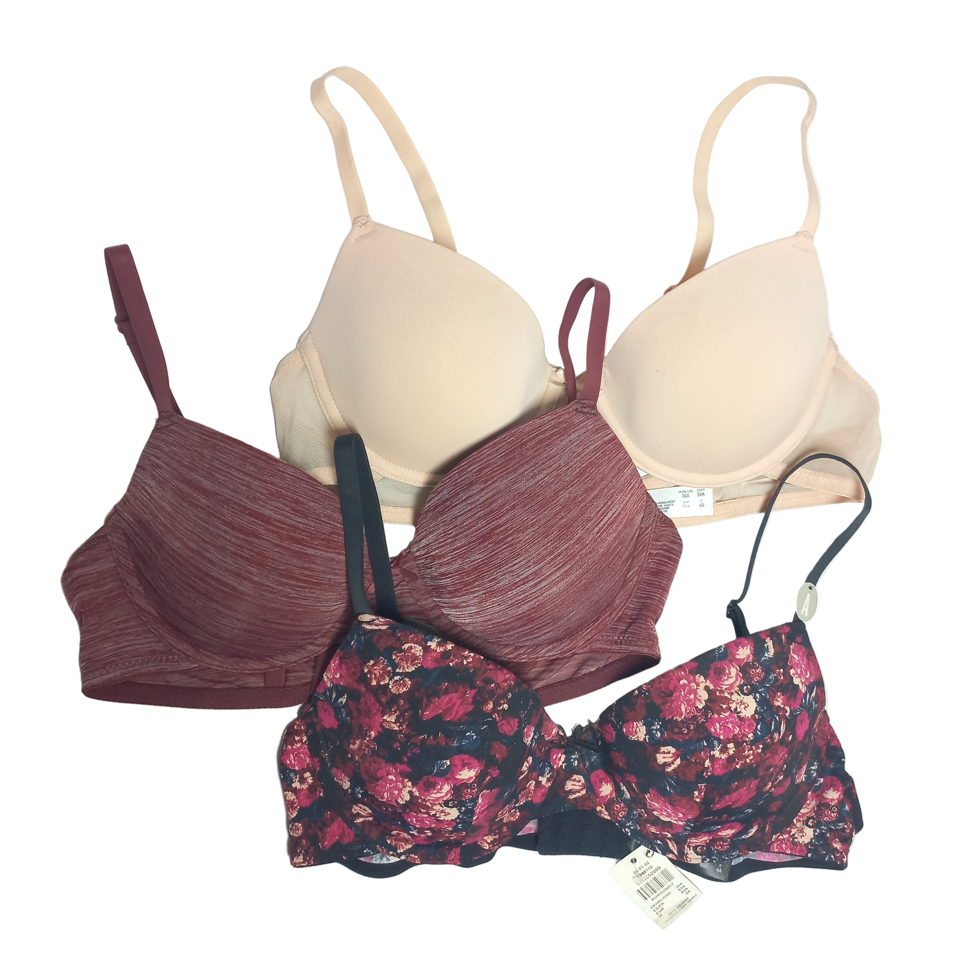 Three Primark T-shirt bras in different styles and colors on a white background