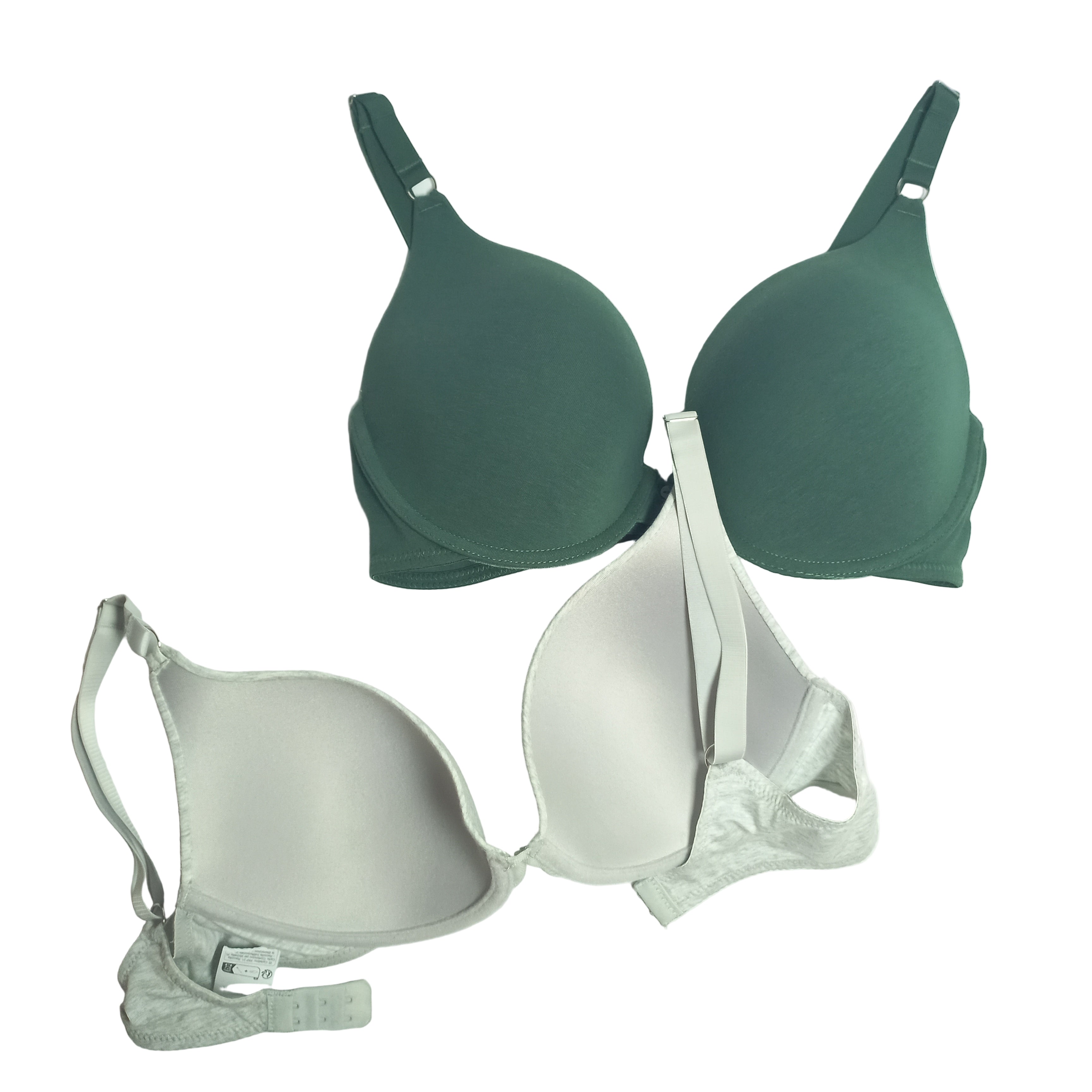 Two bras, one green and one white, on a light gray background, Two essential bras displayed with minimalist philosophy